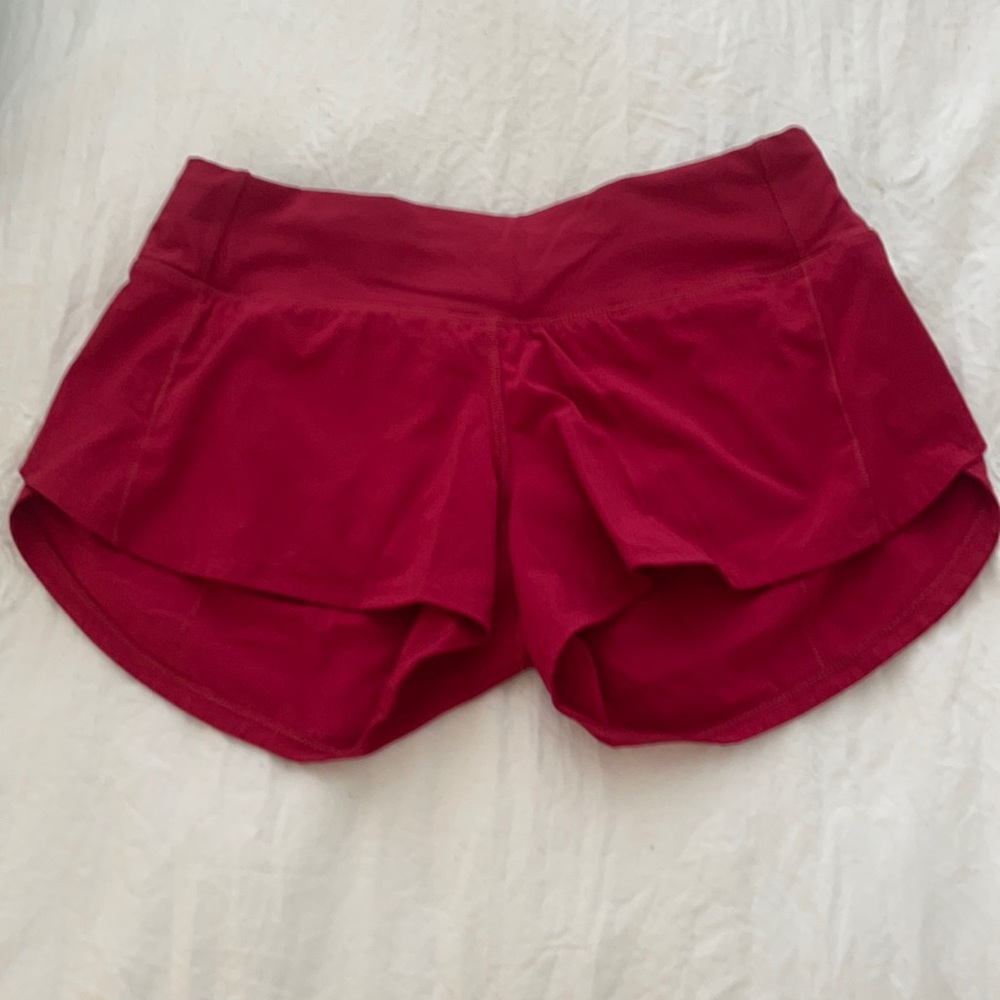 Size 4 red lululemon speed up shorts.
